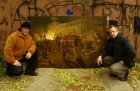 А. Акиндинов и А. Миронов на фоне картины «Чернобыль. Последний день Припяти». 