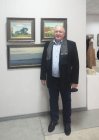 Michael Rytkov at his paintings. The opening of the Jubilee Regional Art Exhibition \"Autumn - 2015\", dedicated to the 75th anniversary of the Ryazan branch of the Union of Artists of Russia. 