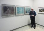 Artist Anatoly Stepanov with his triptych. The opening of the Jubilee Regional Art Exhibition \"Autumn - 2015\", dedicated to the 75th anniversary of the Ryazan branch of the Union of Artists of Russia. 