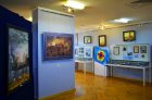 On an exposition. At the left - to the right: a picture of the Honored artist of Chuvashia – Valeriy Bobkov, Alexey Akindinov\'s picture \"Chernobyl. Last day of Pripyat.\" Chuvash national museum. 