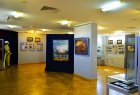 Alexey Akindinov\'s picture \"Chernobyl. The last day of Pripyat\" in an exposition. Nearby a picture of the Honored artist of Chuvashia – Valeria Bobkova. Chuvash national museum. 
