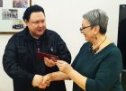Chairman of the Russian Union of Professional Writers, Irina Ivanovna Manina (Moscow), presents the RSPL membership card to Alexey Akindinov. Meeting of the RSPL members. Ryazan Regional Universal Scientific Library named after Gorky. November 12, 20