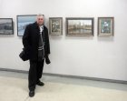 The artist – Nikolay Roslyakov at the pictures. The Spring 2015 exhibition devoted to the 70 anniversary of the Victory over fascism. Showroom of the Union of artists of Russia, Ryazan. April 23. Russia.