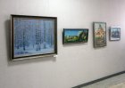 At the left – Vladimir Reshedko\'s picture, on the right – Victor Korsakov\'s pictures. On an exposition. The Spring 2015 exhibition devoted to the 70 anniversary of the Victory over fascism. Showroom of the Union of artists of Russia, Ryazan. April 23