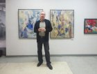 The honored artist of Russia, the member of the Russian academy of Arts – Vasily Nikolaev at the pictures. Opening of the reporting Regional art exhibition \"Spring of 2016\". April 1, 2016. Showroom of the Union of artists of Russia, Ryazan.