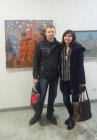 The artist is Andrey Mironov with the spouse – Irina, at Alexey Akindinov\'s picture. Opening of the reporting Regional art exhibition \"Spring of 2016\". April 1, 2016. Showroom of the Union of artists of Russia, Ryazan.