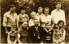 Lower row, from left to right: Alexey Akindinov, grandmother Shura, grandfather Ivan, brother Kolya, sister Olya, aunt Ania. 