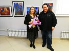 Yekaterina Orzhikhovskaya (artist-teacher, participant of the exhibition) and Alexey Akindinov near Alexey\'s works at the opening of the exhibition \"Inspiration by Ornament\". Lyubertsy Art Gallery, February 4, 2023 Moscow.