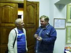 Alexey Akindinov talks to the journalist of the “Zakharovsky Vestnik” newspaper. Zakharovsky museum of local lore, opening of a personal exhibition of Alexey Akindinov \"My small Homeland\", on June 2, 2016, Ryazan region, Russia.