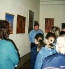 Alexey leads excursion on the exhibition in the State Museum of local lore, in Sasovo, Ryazan. 2003.