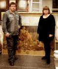 Alexey Akindinov and Svetlana V. Babina, at a picture bought from Alexey \"Ice knights\" by Gallery \"New Hermitage - one\".