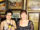 At Alexey Akindinov\'s pictures: \"Sketch to a picture the Sky over New York\" and \"Old Brooklyn\" from Irina and Edward Majbaum\'s collection. At the left: Irina Majbaum.