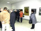 Spectators at Alexey Akindinov\'s picture «the Self-portrait under a dogrose bush».