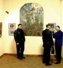Alexey Akindinov near his diploma-picture \"Stargazer\".