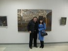 Алексей и Анна Филимонова на выставке «Осень 2008», на фоне картины Алексея «Док-Тихий».