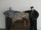 The Honoured painter Victor Korsakov and Alexey at the exposition of the exhibition with Alexey\'s pictures.