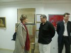 With the employee of a museum of Victor Ivanov. At opening of a personal exhibition of Alexey Akindinov on September, 25th 2009. On the right - Nikolay Matrosov (director RZN.info).