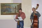 At opening of a group exhibition \"OrnaMentalnost\", the Ryazan Drama theater. 2006. Performance of musicians. At left - Dmitry Elkov also known as Mitts, on right - Konstantin Pankratov.